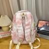 The new large-capacity multi-compartment schoolbag is tie-dyed, cute and sweet literary backpack, versatile casual and lightweight make-up bag.