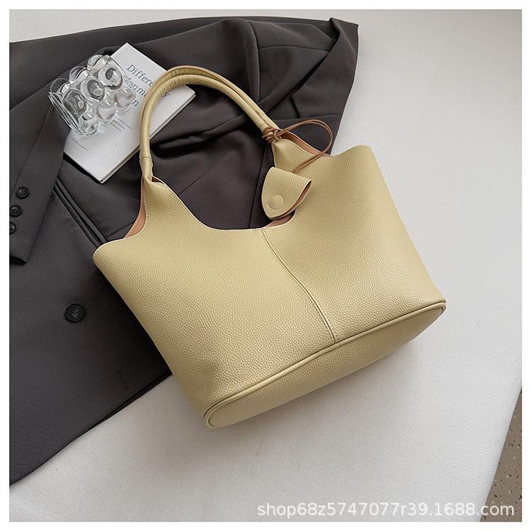 ins Korean version of fashion large-capacity tote bag women's 2025 new versatile hand-held basket bag textured shoulder bag