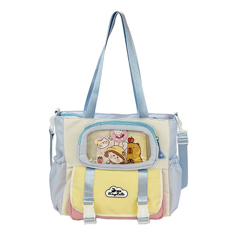 Large capacity messenger bag female college student class leisure commuter bag make-up bag cute contrasting color portable shoulder bag