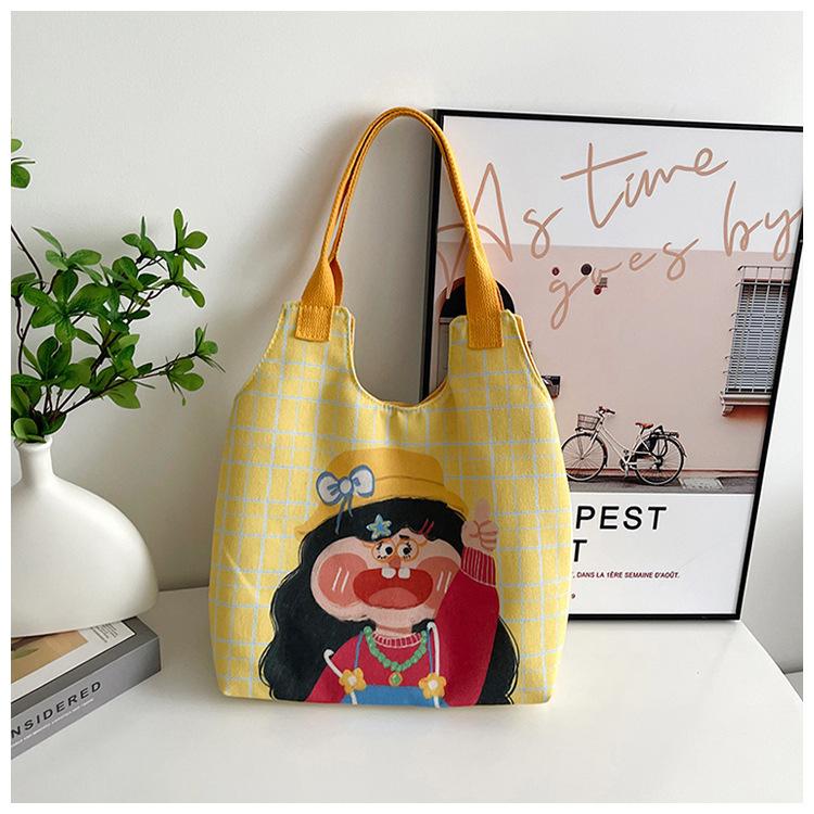 Korean version of cartoon graffiti illustration large capacity canvas bag girl funny hand-drawn comic portable shoulder bag tide