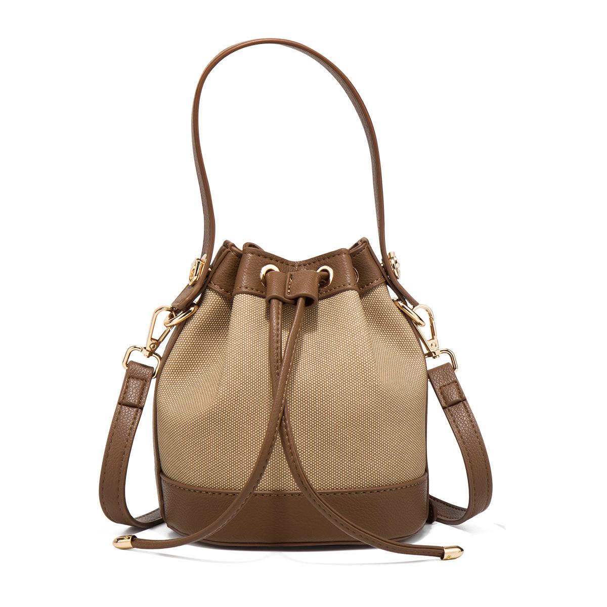 

Small bucket bag women s high-end bag 2025 new niche vegetable basket women s bag super hot portable messenger bag summer темно-коричневого