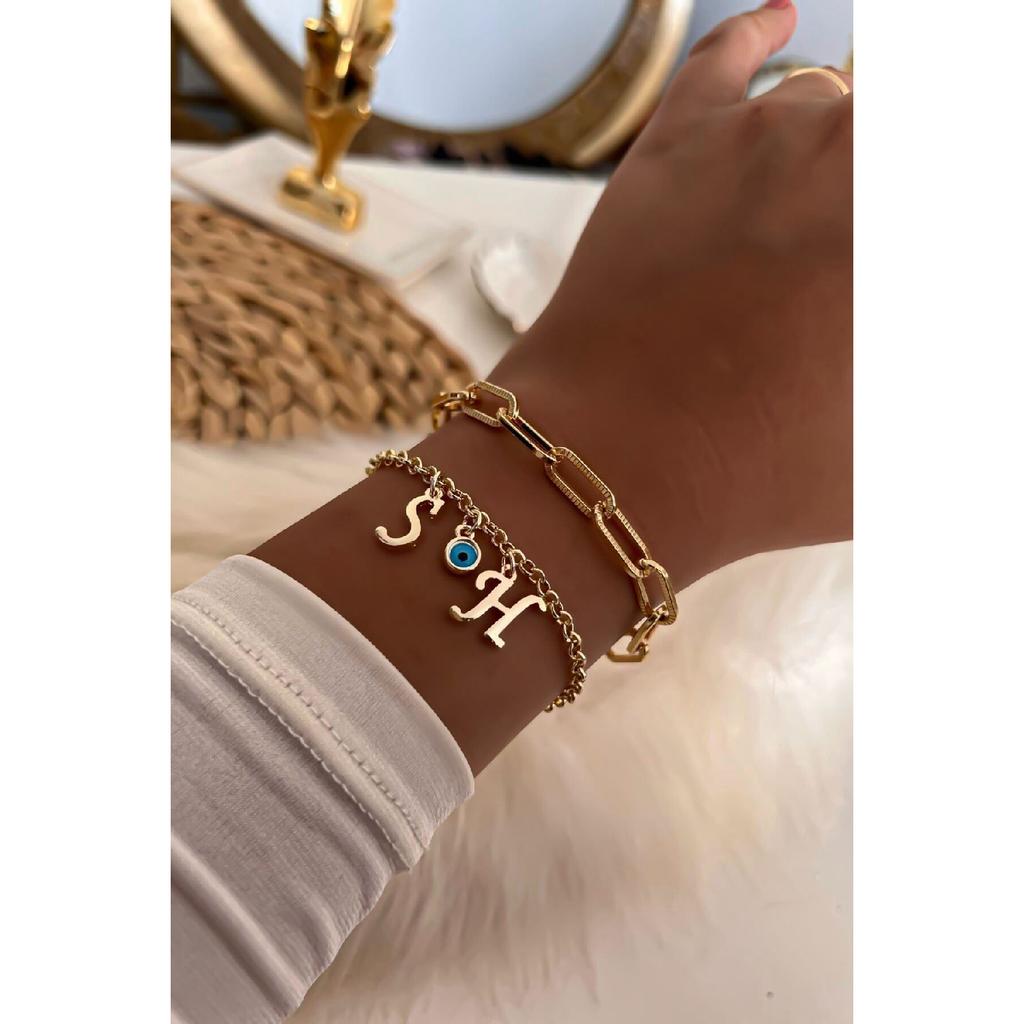 Kombinace řetízkového náramku se zlatými barevnými písmeny a volitelným detailem Evil Eye 31