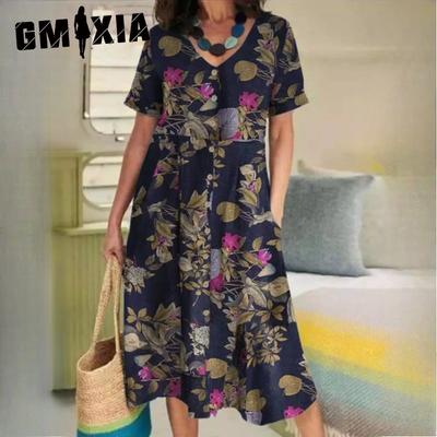 Sommerkleid aus Baumwolle und Leinen im Vintage-Ethno-Stil mit Print und lockeren, kurzen Ärmeln und großem Swing