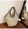 Niche woven bag women's new casual summer vacation straw bag large capacity portable shoulder armpit bag