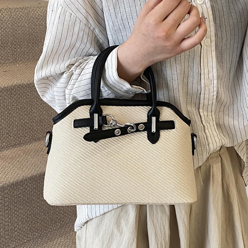 Korean version hot-selling contrasting color casual portable shell bag high-end texture niche commuting fashion versatile messenger bag women