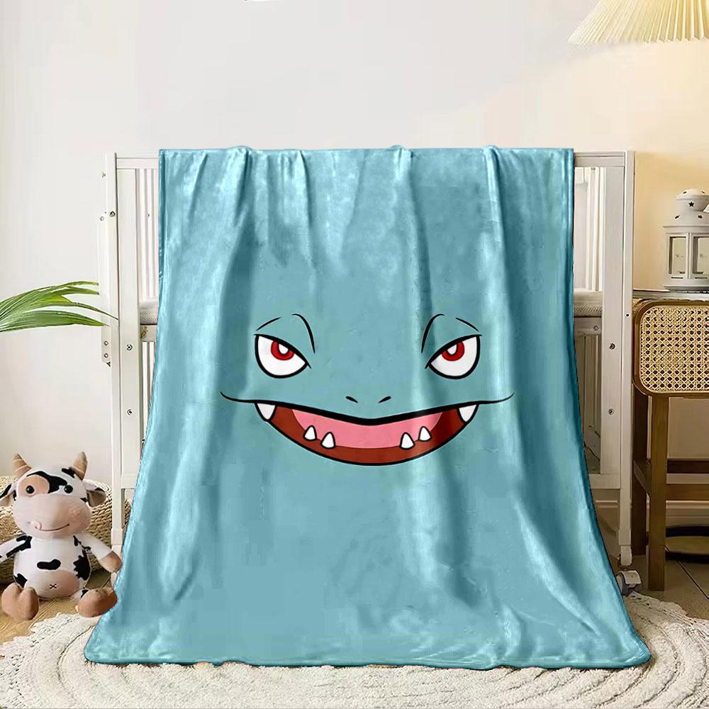 

A cartoon face with red eyes, sharp teeth, and a mischievous smile. for all seasons blanket lunch break throw gift 80cm x 120cm