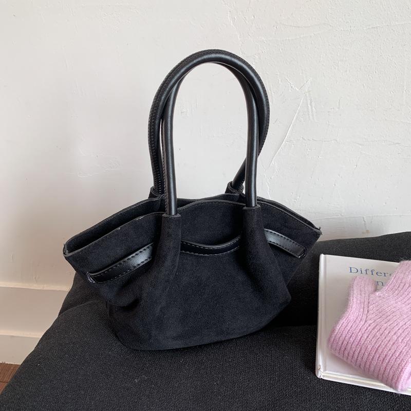 Frosted retro portable small bag women's 2025 new fashion bucket bag niche design messenger bag wing bag tide