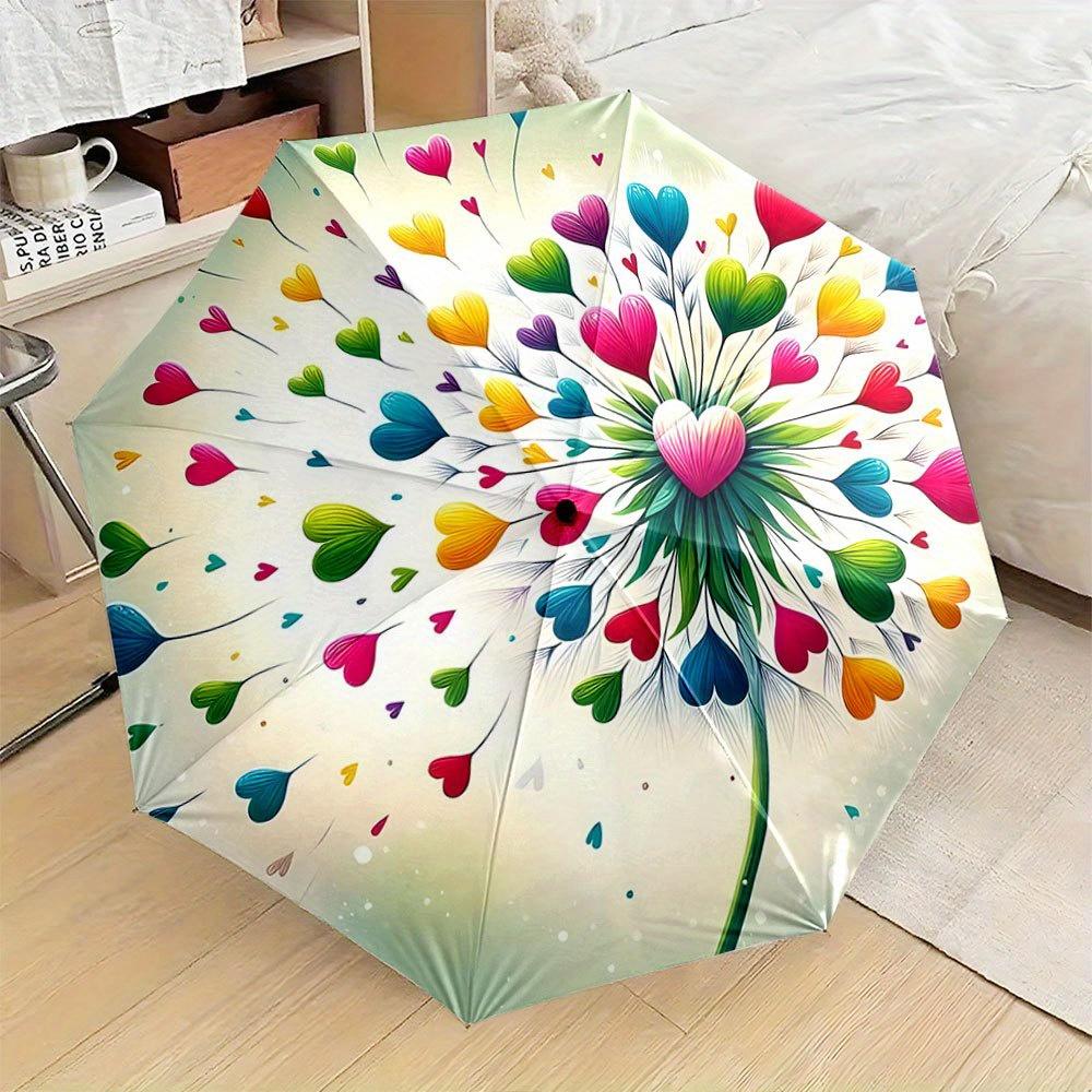This Compact Umbrella Showcases a Lively Pattern with Bright, Heart-Shaped Petals Extending from a Central Heart Formation, Re