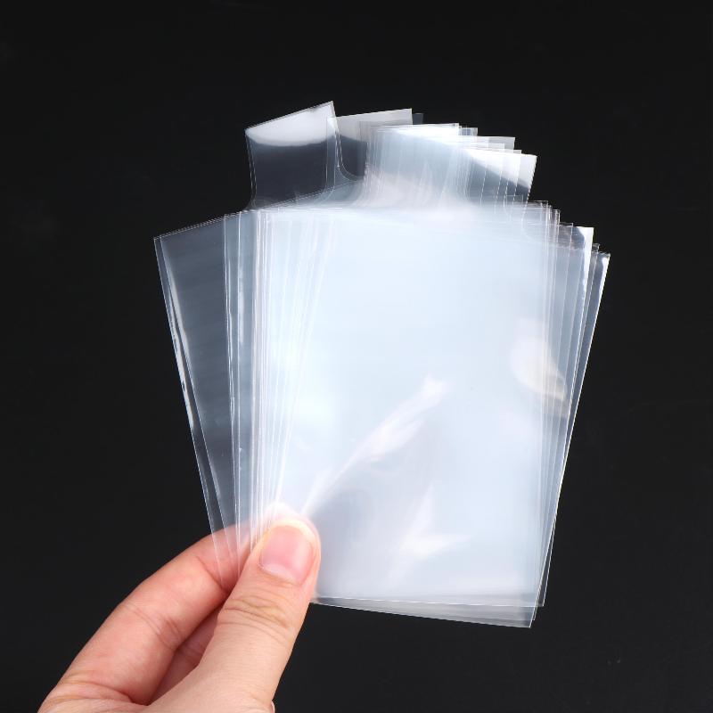 100Pcs Clear Smooth Raised Card Sleeves Transparent Pull Tab Protectors for Trading Card Storage