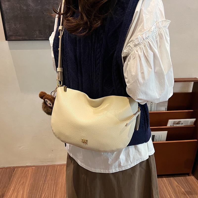 

Нишевая цветовая гамма 2025 осень-зима новая женская сумка сумка-горошек pu плечевая кроссбоди модная трендовая сумка 32*6*21