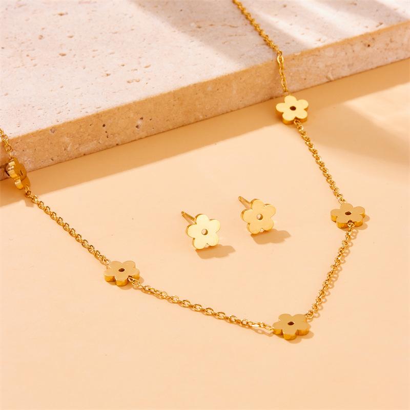 Gold Flower Charm Jewelry Set with Necklace Bracelet and Stud Earrings