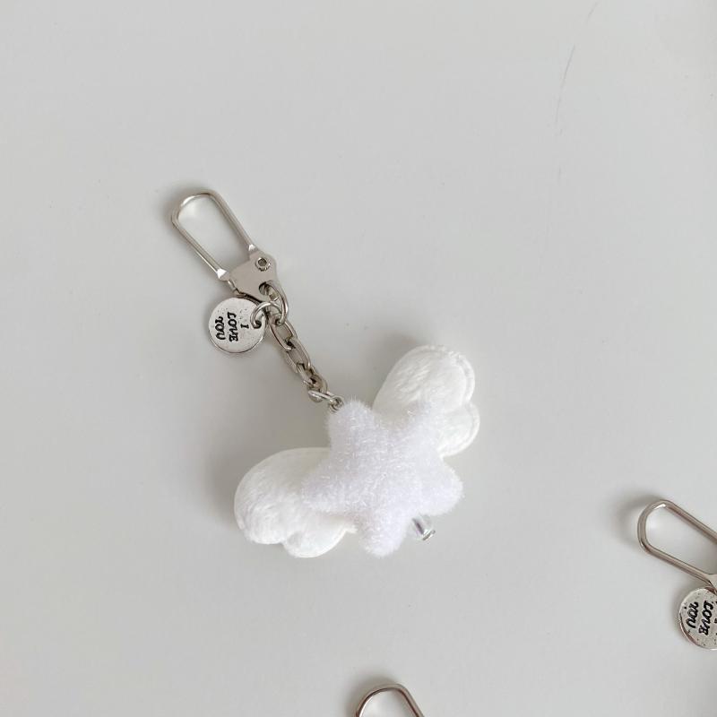 

Елегантний брелок з ангельським крилом та зіркою з флокуванням Легкий брелок Шарм для сумки Для модних жінок Декоративні аксесуари