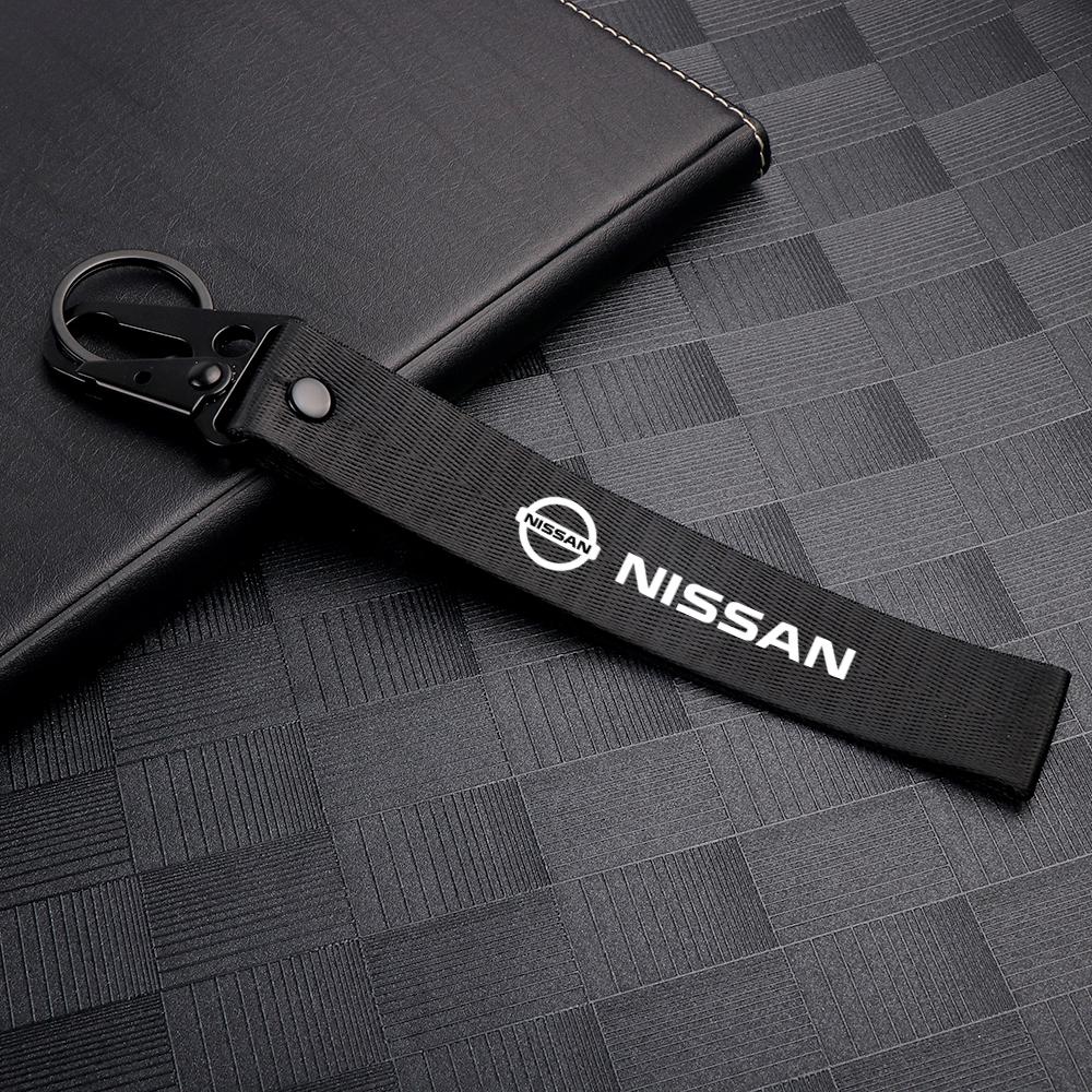 Tapa de Válvula de Neumático de Coche de Aluminio Insignia de Coche Llavero de Nylon Accesorios Para Nissan Nismo X-Trail Qashqai J11 Juke Altima Note Skyline