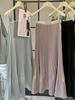 2026 Early Spring A-Line Pleated Skirt: Gentle, Versatile Design for Women's Mid-Length Fashion.