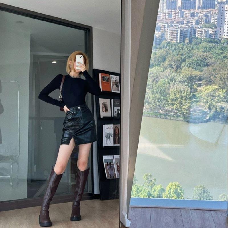 Черные юбки с разрезом для женщин — фото 9