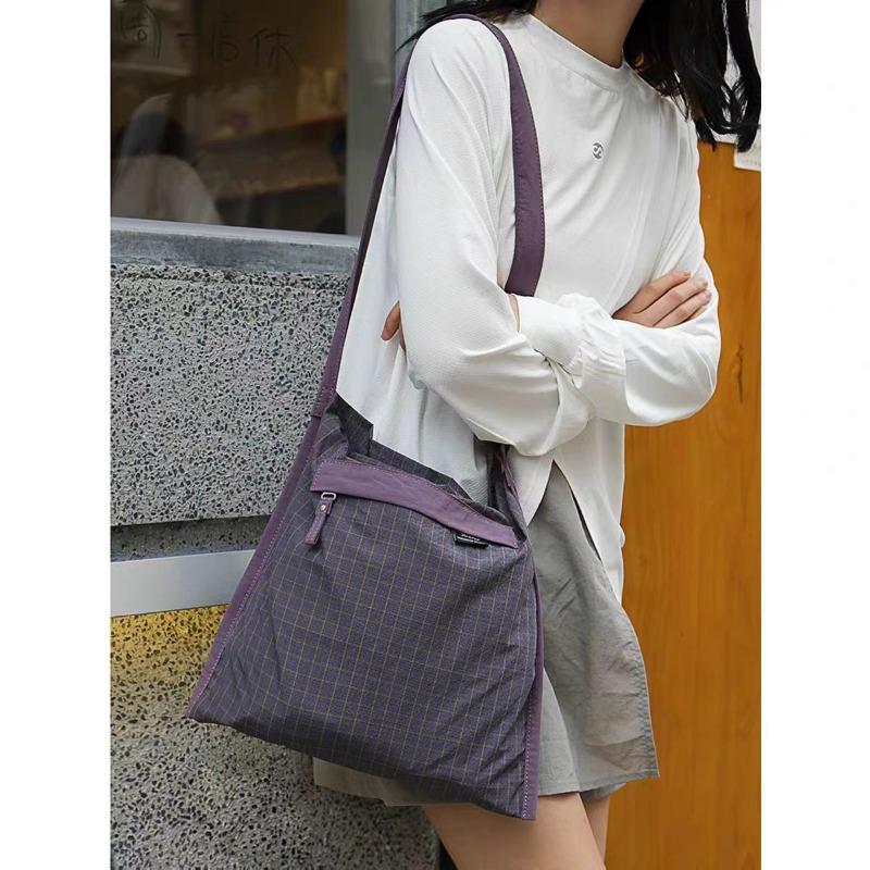 

New mountain lightweight outdoor water-proof shoulder nylon bag women s purple Japanese casual plaid crossbody фиолетовый