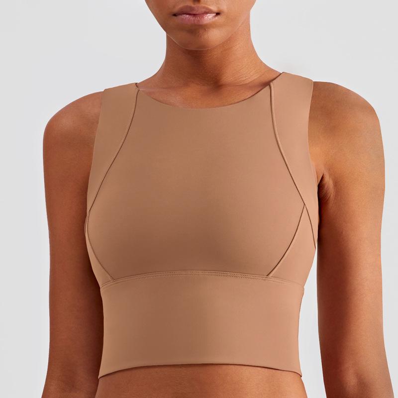 

Женский противоударный спортивный жилет для йоги и бега - Большая поддержка груди, Сборки по бокам, Без рукавов и облегающий крой Small