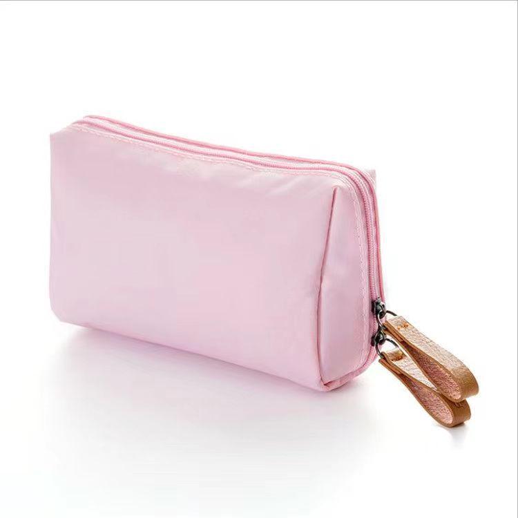 

Compact Travel Makeup and Sanitary Bag: Elegant, Portable Lipstick & Essentials Organizer розовый