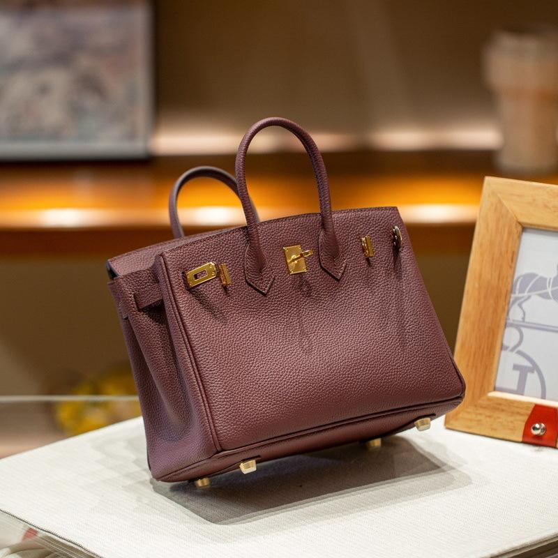 Altın toka gümüş toka üst kat sığır derisi togo derisi platin çanta (togo-2530BK)