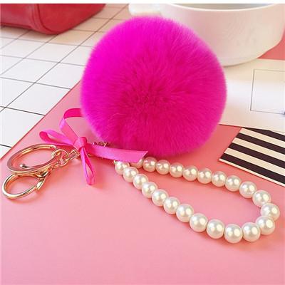 Auto Damen Handtasche Schlüsselanhänger Mode Perlenkette Kristallflasche Schleife Pompon Schlüsselanhänger Flauschiger Pompom Schlüsselanhänger Schmuck