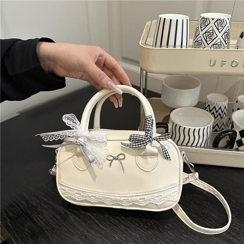 Trendy personality popular versatile shoulder bag women's foreign leisure high sense solid color ribbon temperament messenger bag