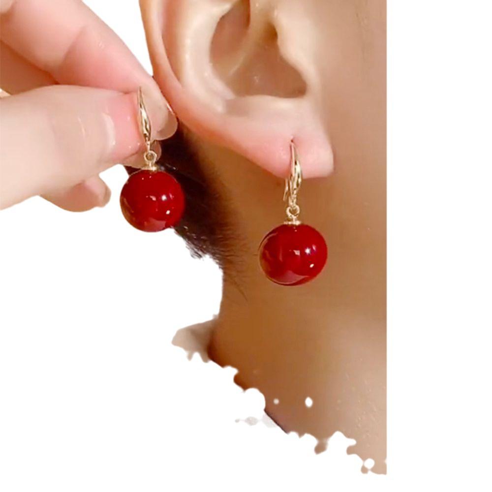 2024 French Minimalist Red Pearl Earrings: Elegant Retro High-End Ear Hooks for a Festive New Year