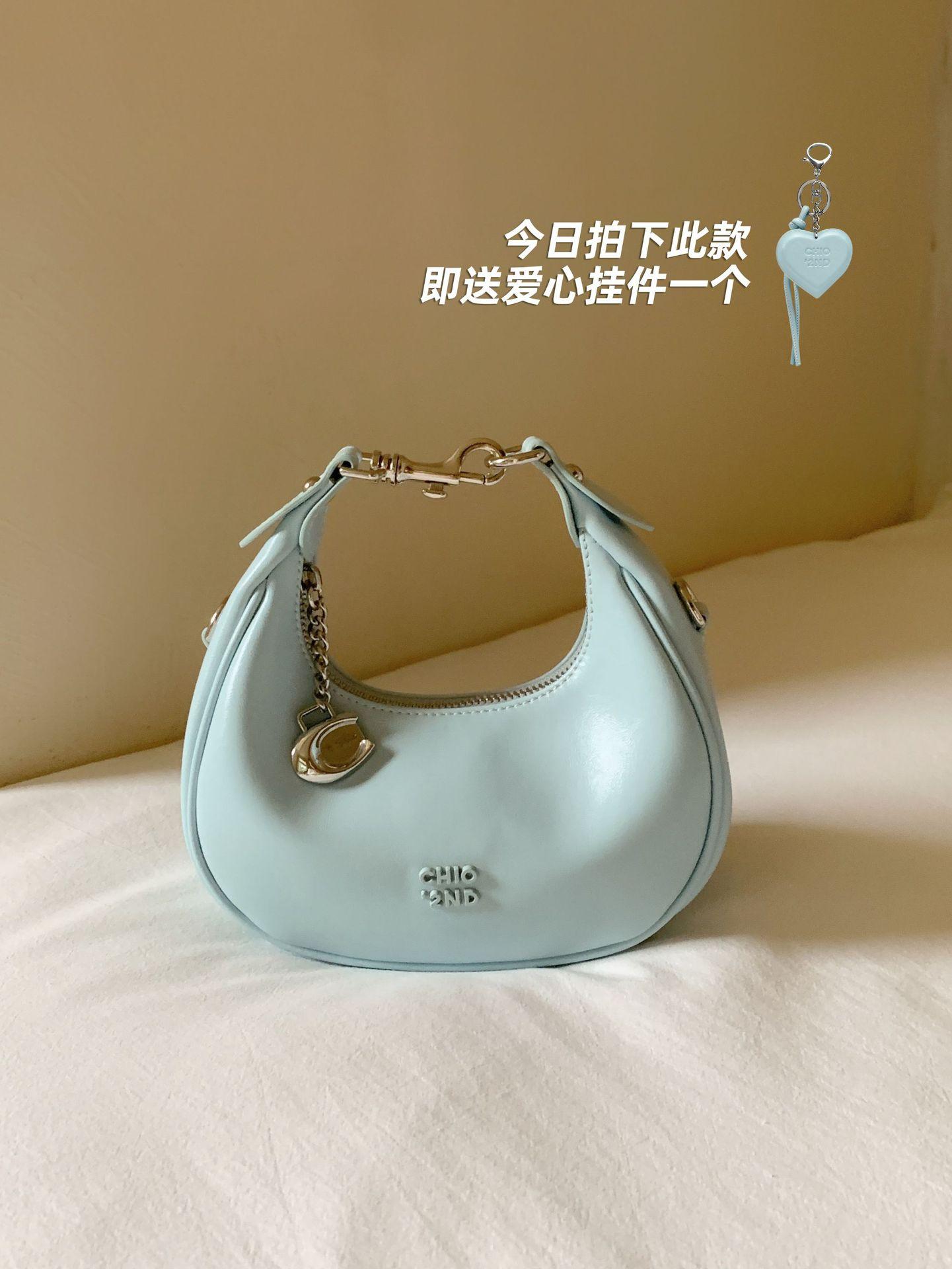 

One Crescent Moon Cowhide Leather Shoulder Bag Women s Design Sense Niche Handbag Crossbody Bag м ята зелений колір