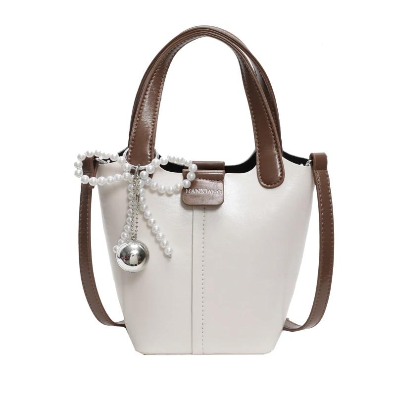 

Новые модные роскошные женские сумки, мягкие, корейский стиль, большая вместимость, бант, жемчуг, сплошные дизайнерские сумки с верхней ручкой