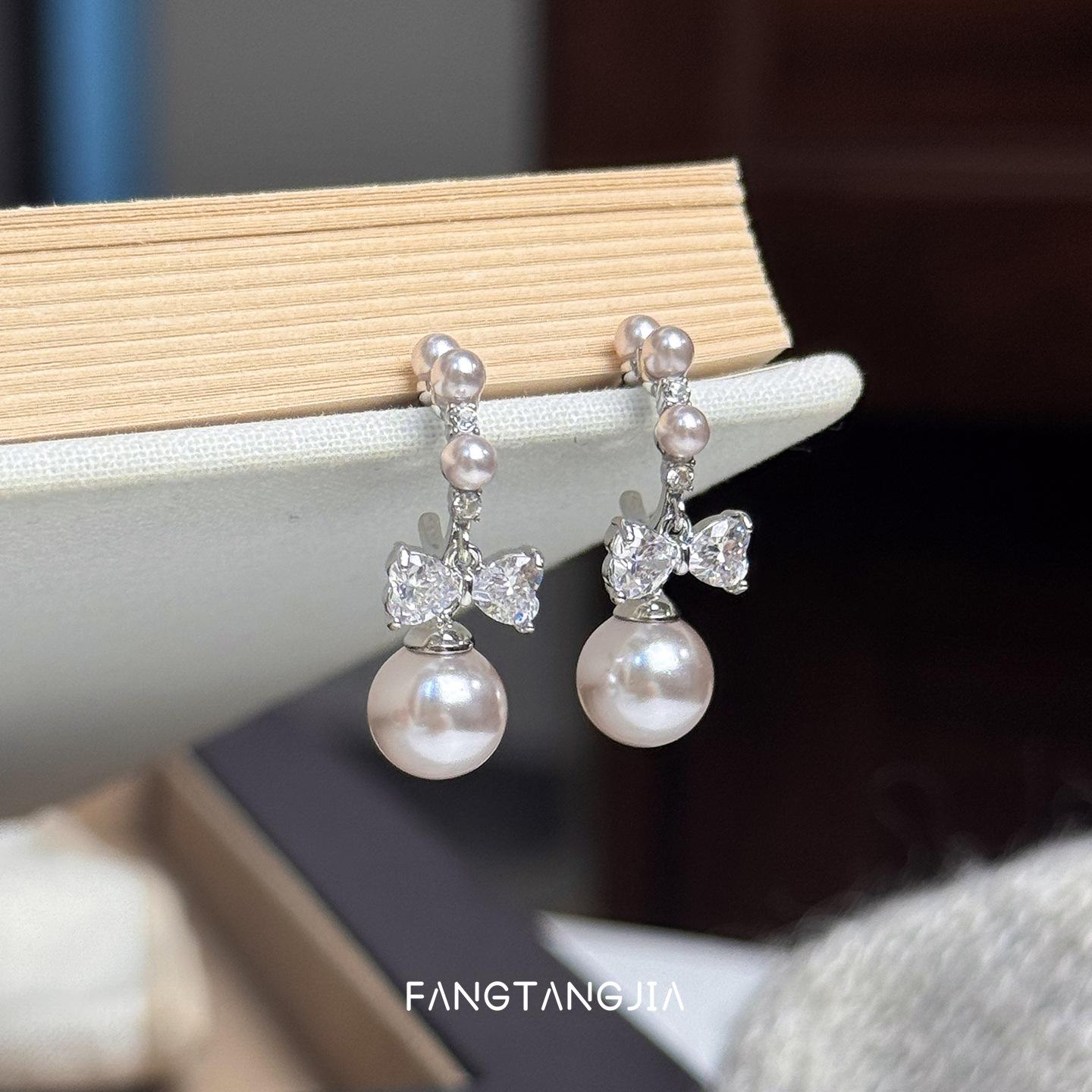 

Серьги-подвески из серебряных игл S925 с жемчугом Manta Rose и бантом, премиальный нишевый дизайн