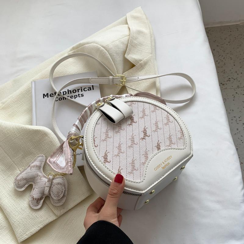 

IELGY women s fashion cool wind messenger bag, small round bag with silk scarf бежевий