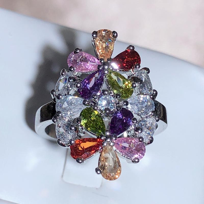 

Блестящее кольцо в форме цветка с инкрустацией белым кристаллом циркония серебристого цвета для женщин, свадебные украшения и аксессуары для вечеринок 10