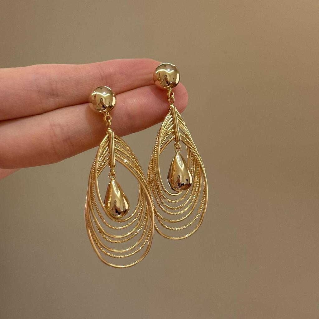 Silver Needle Geometric Openwork Round Pendant Earrings with European and American Exaggerated Style for Women.