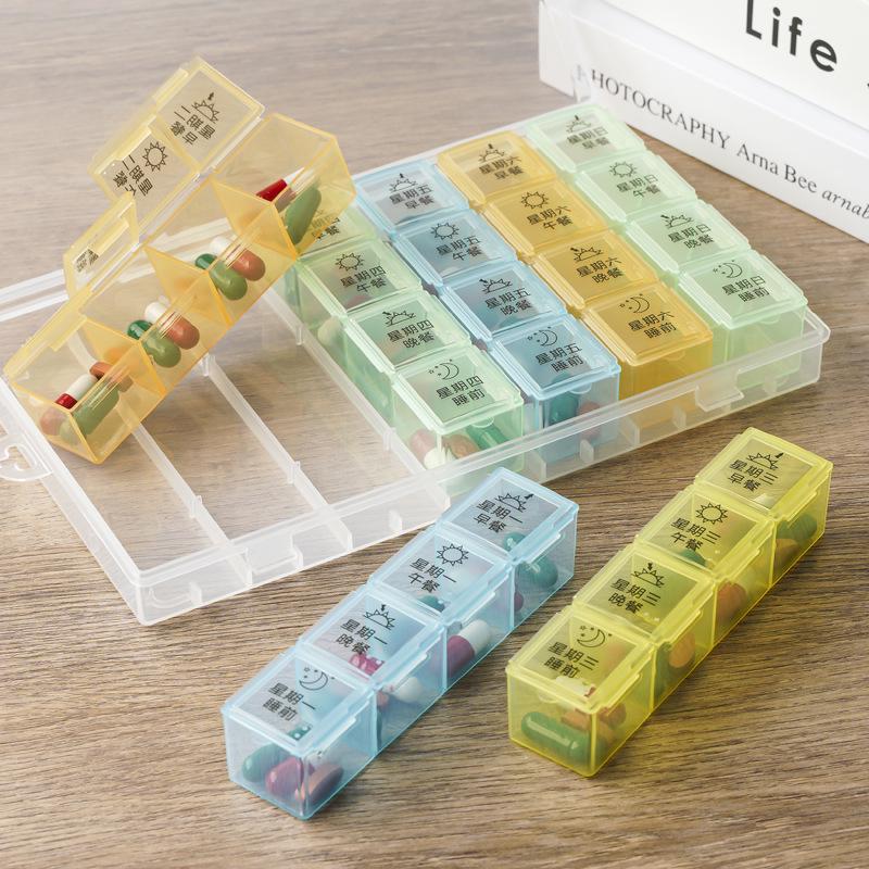 Starší 7denní 28přihrádkový přenosný organizér na pilulky s rozdělovačem