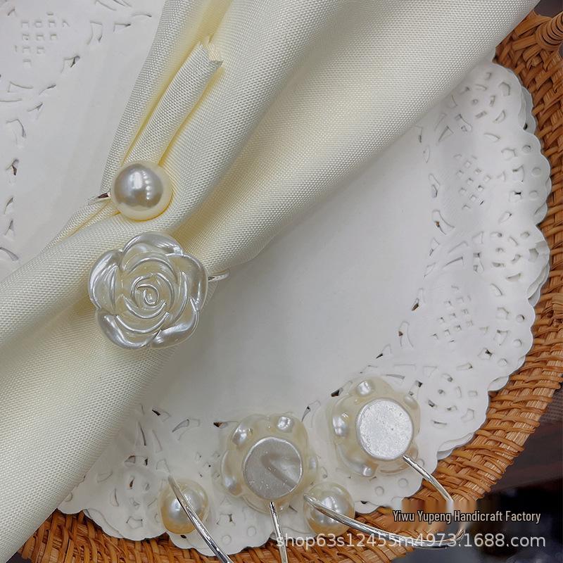 

Изысканное украшение для салфеток в виде кольца для свадьбы в отеле Rose Pearl