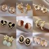 Elegant and sophisticated earrings for women, vintage niche design pearl studs, popular online trend ear accessories