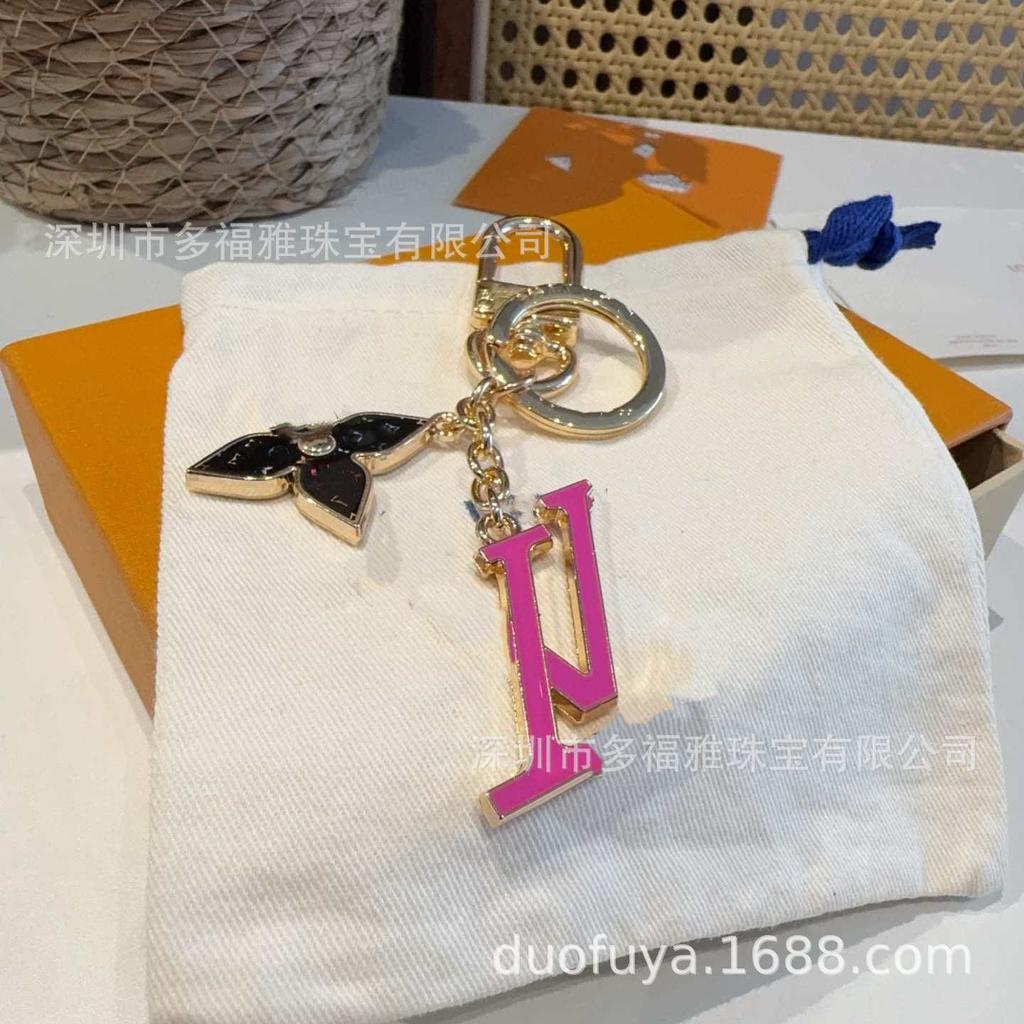 Donkey Brand Women's Black & White Tricolor Bag with Four-leaf Clover Keychain Pendant