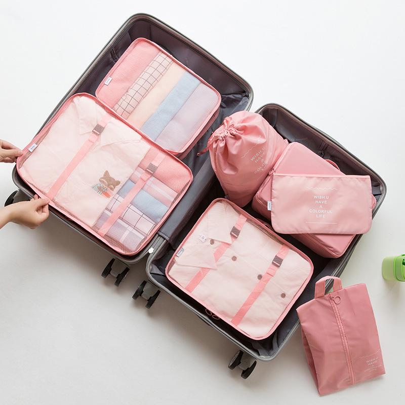 

Seven-Piece Travel Set: Storage Bags for Toiletries, Cosmetics, Clothes, Shoes, and Luggage.