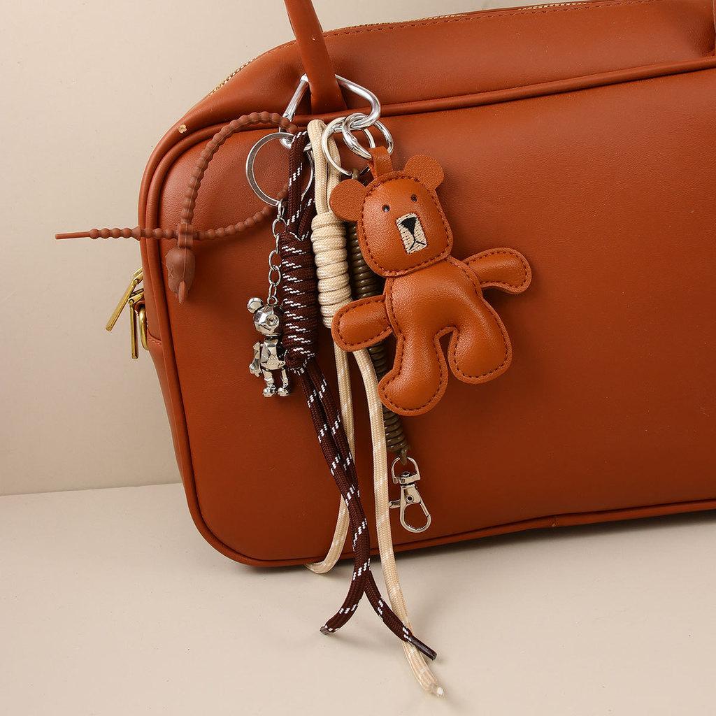 Leather Brown Bear Keychain With Articulated Limbs And Geometric Design For Fashion Accessories