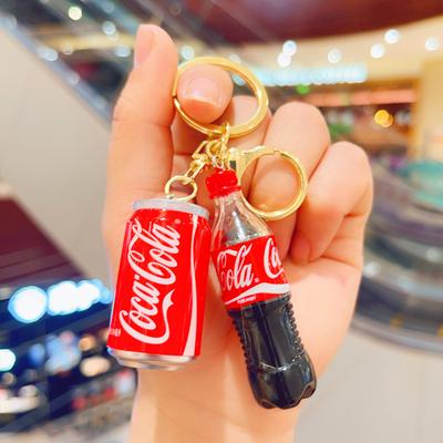 Creatieve Coca-Cola sleutelhanger, realistische Coca-Cola fles, accessoire voor aan de tas of als relatiegeschenk.