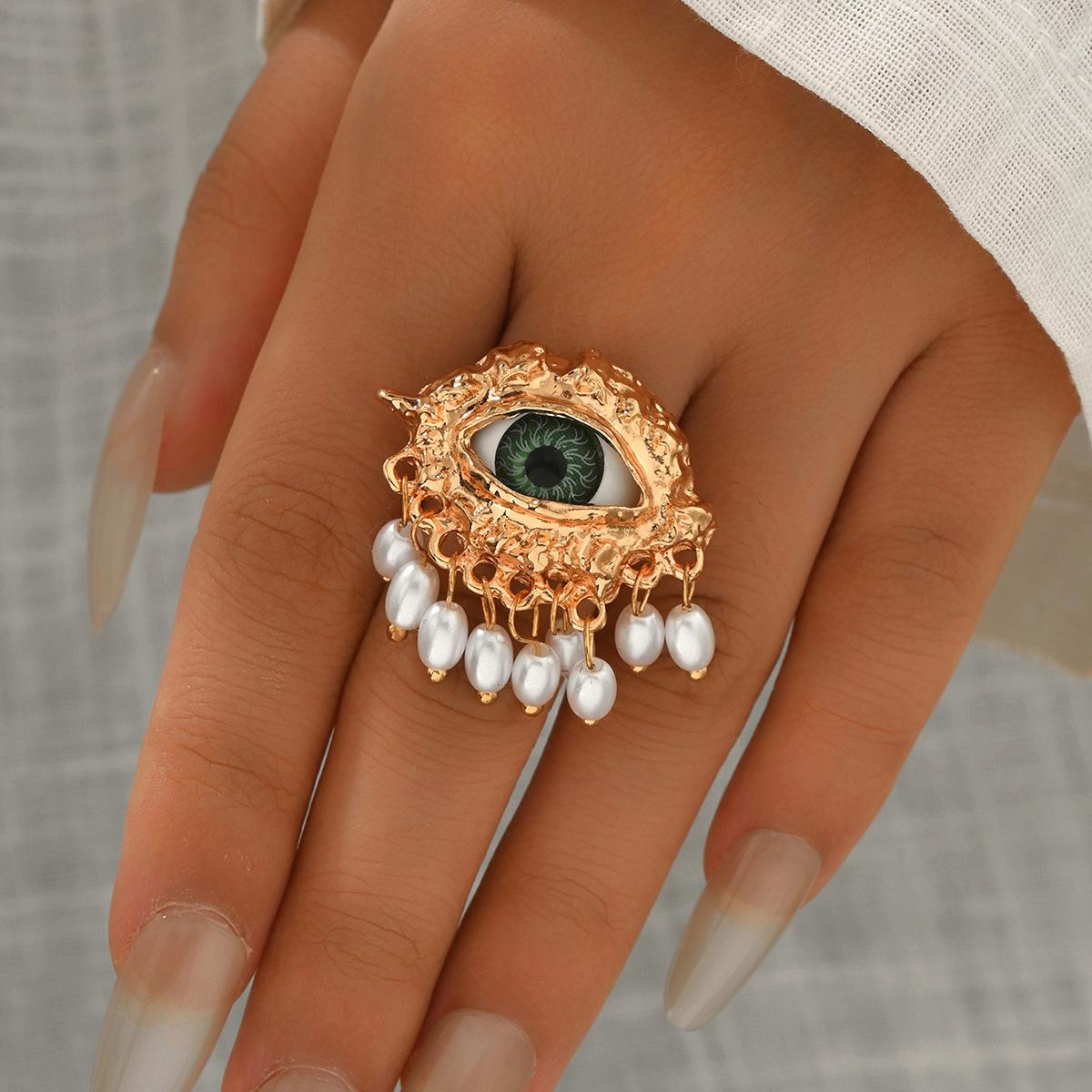 

Medieval rings European and American jewelry Devil s eye light luxury niche exaggerated pearl open ring accessories