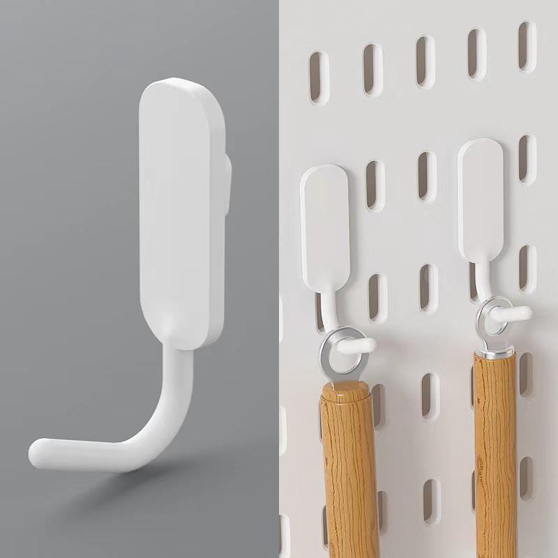 Pannello forato da parete senza foratura: Espositore personalizzabile con ganci e cestini per la casa o lo studio.