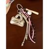 It is the original design of ins wind laser leather, high-end exquisite small bag pendant, keychain, schoolbag pendant.
