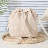 Bohemian Beige Straw Woven Bucket Crossbody Bag with Drawstring Closure Adjustable Leather Strap, Ideal for Beach Casual Daily