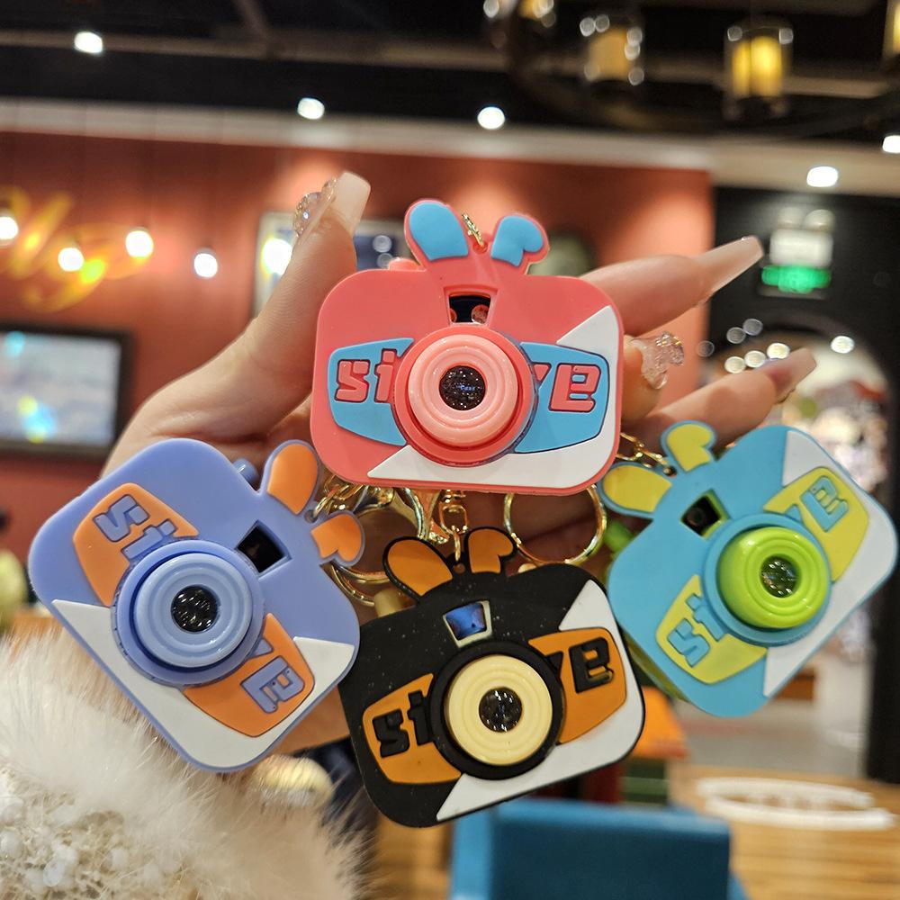 Niedliche Mini-Projektionskamera Cartoon Leuchtendes Projektionslicht Damenhandtasche Schlüsselanhänger Anhänger