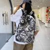 Schulrucksack Amerikanische Persönlichkeit Graffiti Rucksack ins High-School-Schüler College-Student Klasse Schultasche Trendig Mode Große Kapazität Rucksack