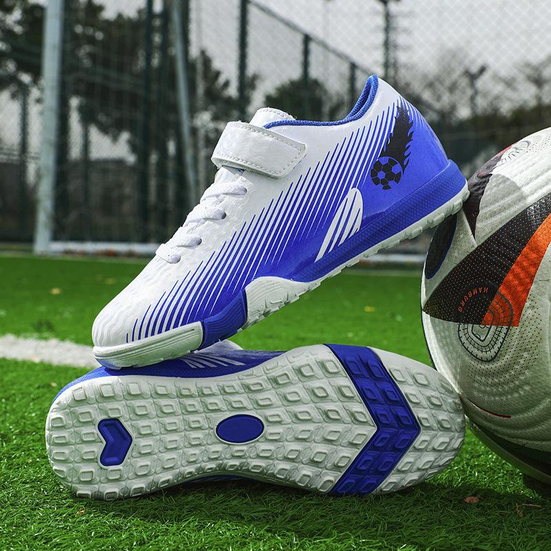 2025 new children's football shoes boys and students girls broken nails Velcro casual game sports shoes