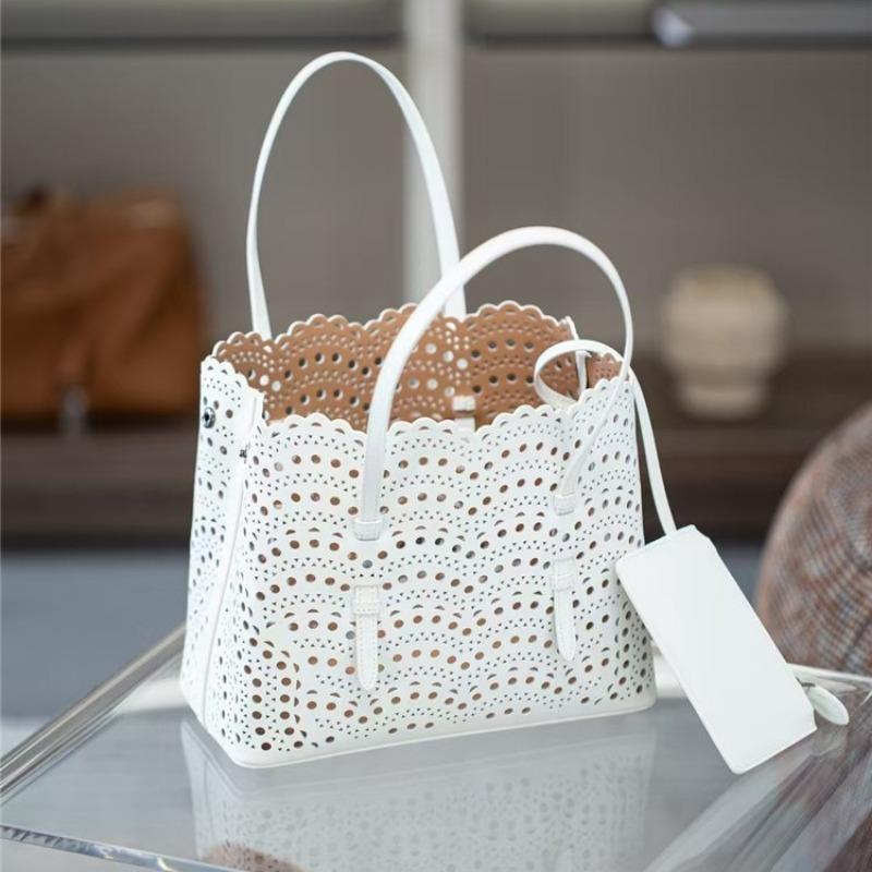 Niche sunflower wave hollow laser engraved cowhide vegetable basket genuine leather women's handbag single shoulder crossbody small bag holder