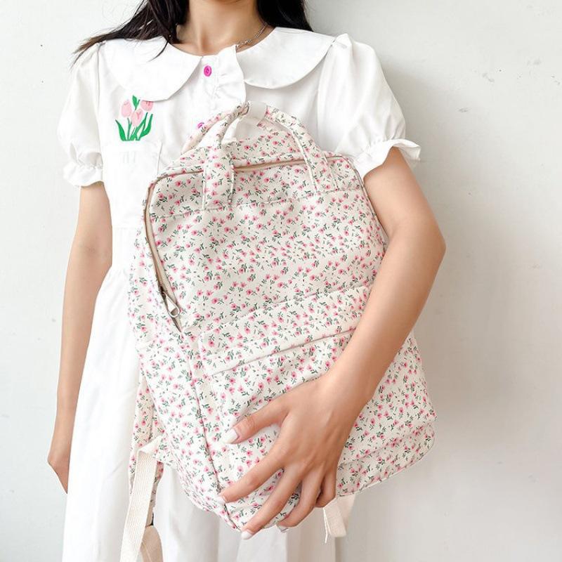 Gentle small floral backpack female Korean ins literary small fresh student schoolbag college style portable backpack 16 inch