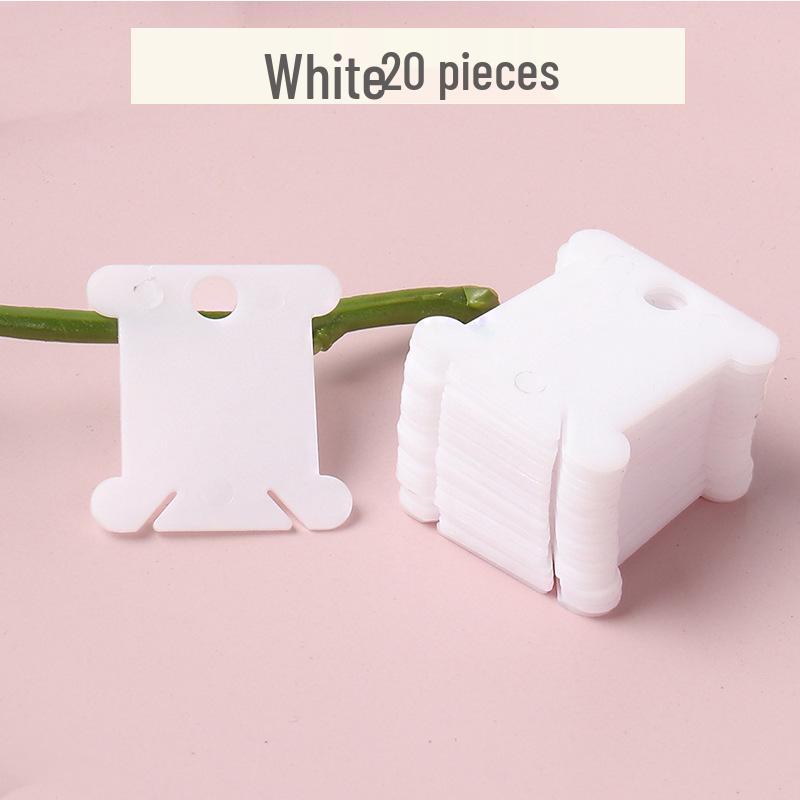 

Кольоровий пластиковий органайзер та намотувач ниток для вишивки хрестиком