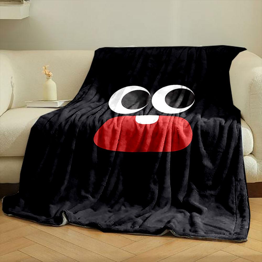 Large cartoon eyes and a red mouth with one tooth on a black background. for all seasons blanket lunch break throw gift